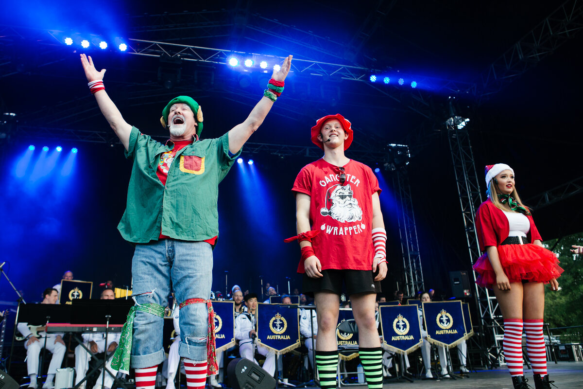 3 performers on stage at Knox Carols 2019