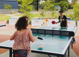 people playing table tennis