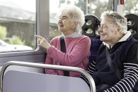 Two people on a bus.