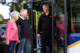 Knox City Council community bus driver Phil Phelan with Knoxfield residents Tilda Lakatos and Barry George.