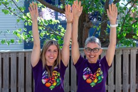 EACH’s Rachael Cavanagh and Sarah Murphy practice yoga. 