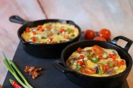 Photograph of two frittatas in a pan