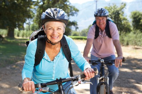 Two people on bikes.